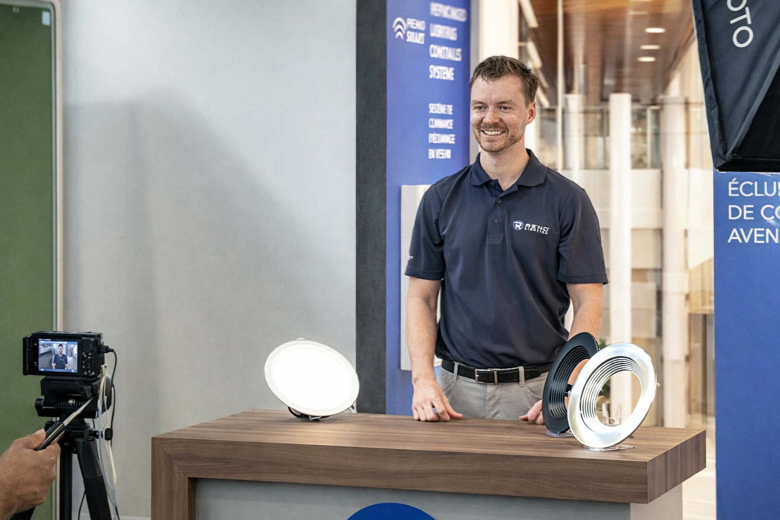 Presenter explaining the features and details of the Light Insider lighting product